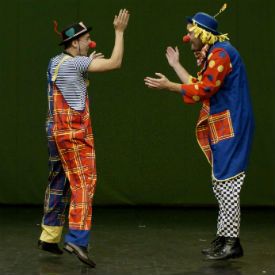 Two-clowns-giving-high-five-how-to-refuse-a-bit-part-in-an-idiots-tale-275w.jpg